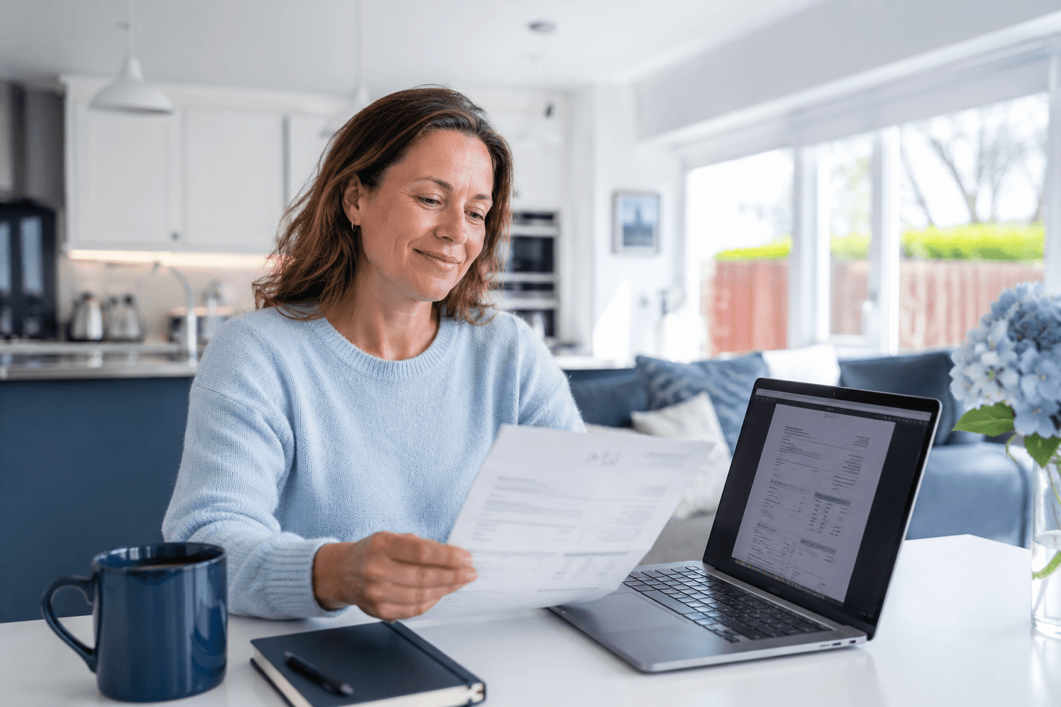 Portfolio landlord reviewing multiple property compliance certificates online